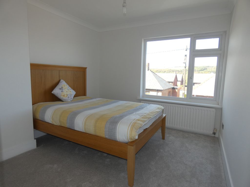 Bedroom One- click for photo gallery